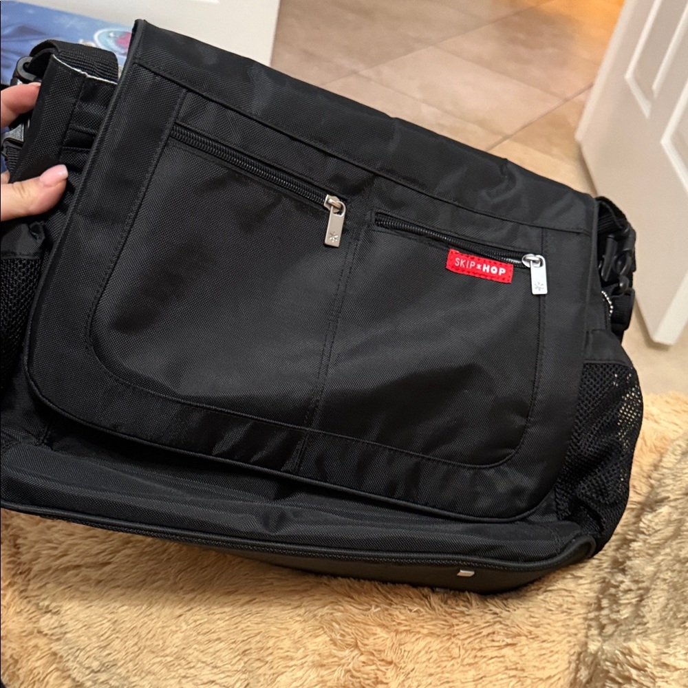 Skip Hop Black Messenger Bag with Red Accent